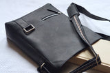 black leather laptop bag