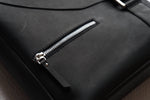 black leather messenger bag