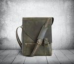green leather laptop bag